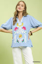 Periwinkle Umgee mixed media V-neck print blouse with long sleeves and relaxed fit, ideal for casual or stylish outfits