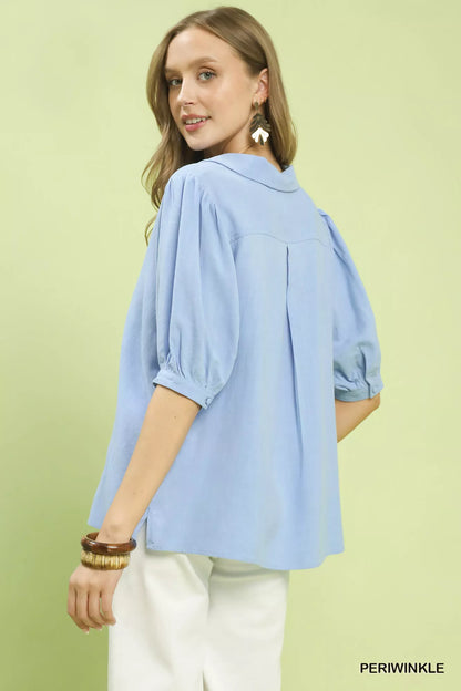 Periwinkle Umgee mixed media V-neck print blouse with long sleeves and relaxed fit, designed by Trendsi.