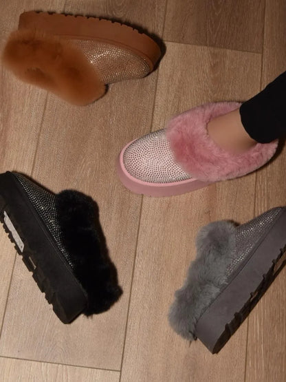 Pink WILD DIVA embellished faux fur platform booties by Trendsi, featuring decorative embellishments and chunky heels.