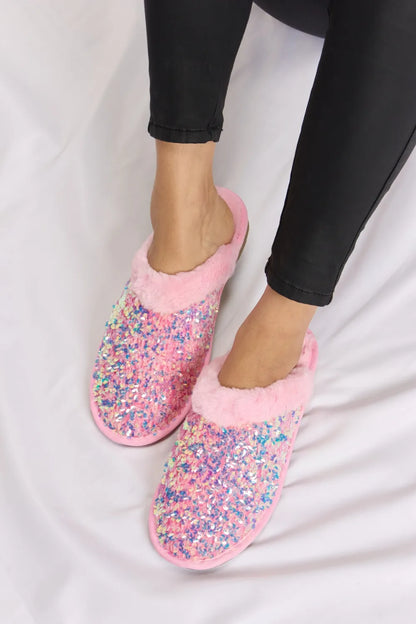 Pink Forever Link sequin plush round toe slippers by Trendsi, featuring soft plush material and sparkling sequin accents.