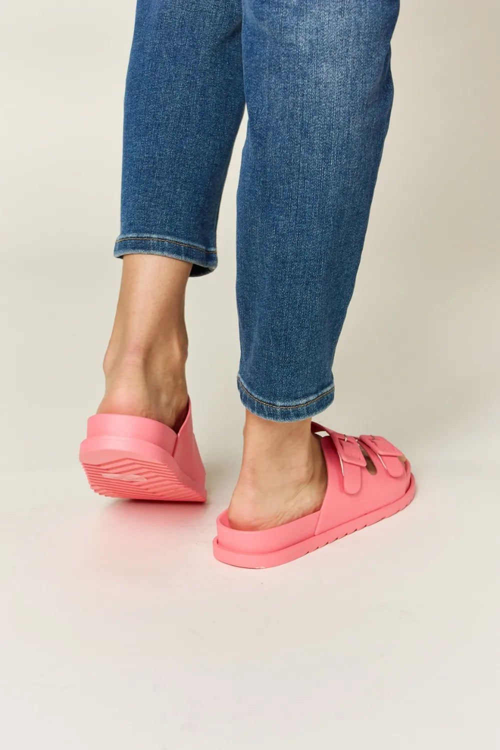 Pink Legend Double Buckle Open Toe Sandals by Trendsi featuring double buckle straps and a stylish open toe design.