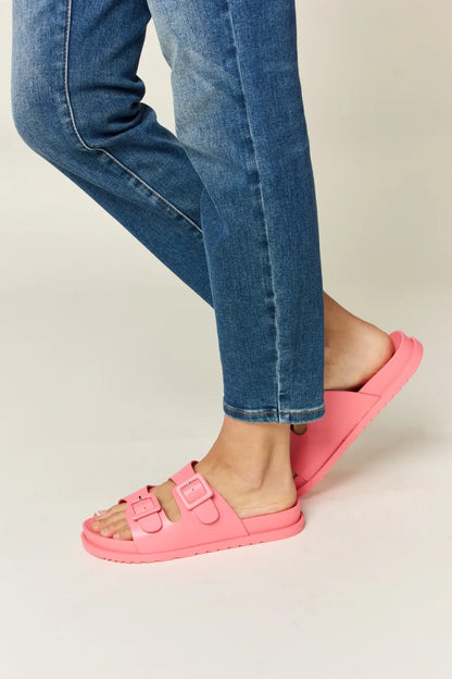 Pink Legend Double Buckle Open Toe Sandals by Trendsi featuring double buckles and a stylish open toe design.