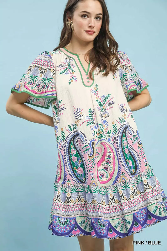 Pink and blue paisley mini dress with flutter sleeves by Umgee, featuring a stylish and flowy design.
