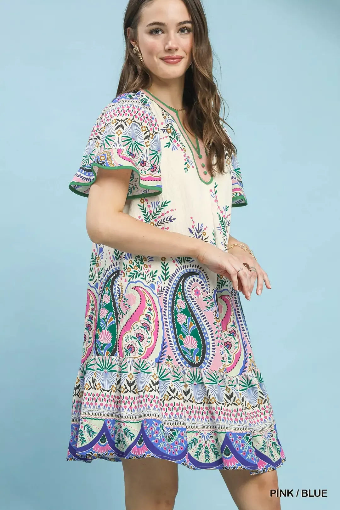 Pink and blue Umgee paisley mini dress with flutter sleeves, featuring a stylish and casual design.