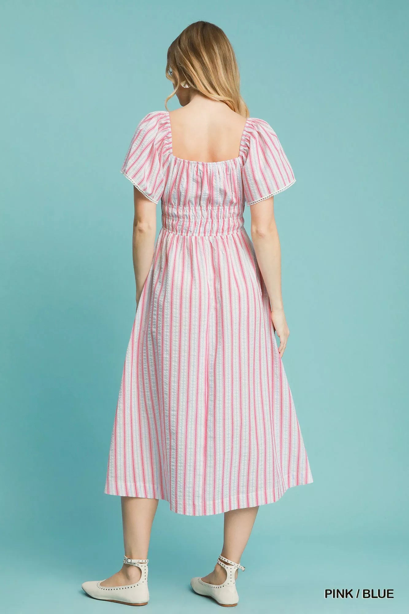 Pink and blue striped Umgee smocked short sleeve midi dress with a relaxed fit, perfect for casual summer wear.