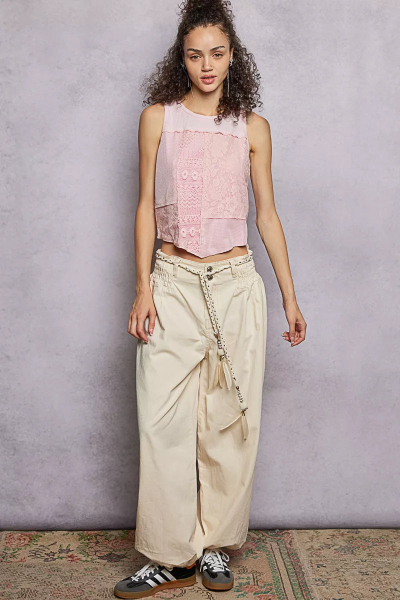 Pink blush ribbed cropped tank top with round neck and lace detail, trendy Trendsi fashion item.