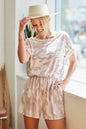 Pink camo print French Terry romper with side pockets from Trendsi, featuring a comfortable, casual design.