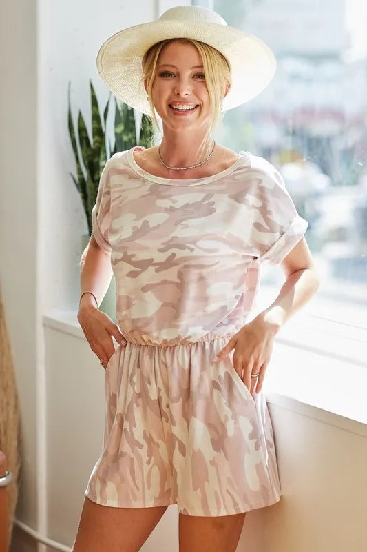 Pink camo print French Terry romper with side pockets by Trendsi, featuring a comfortable, casual design and relaxed fit.