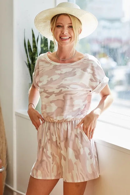Pink camo print French Terry romper with side pockets by Trendsi, featuring a comfortable, casual design and relaxed fit.