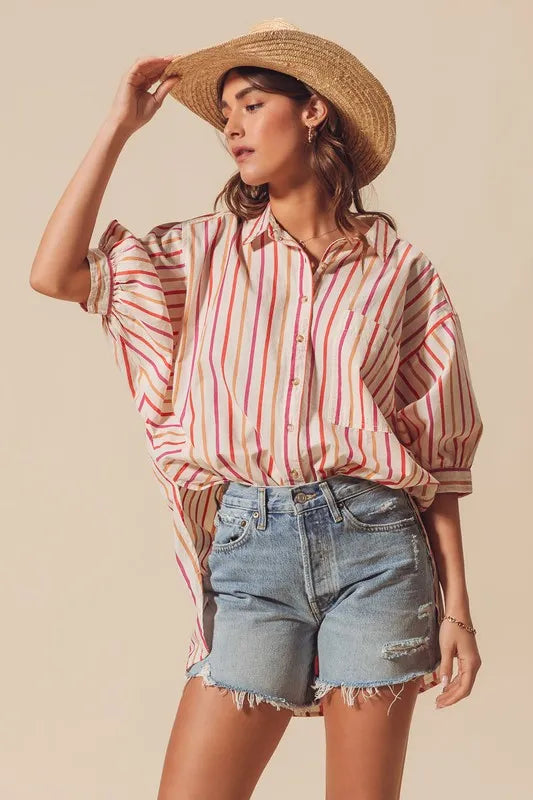 Multicolored stripe button-down shirt from SO ME by Trendsi, featuring pink and vibrant striped pattern and classic collar.