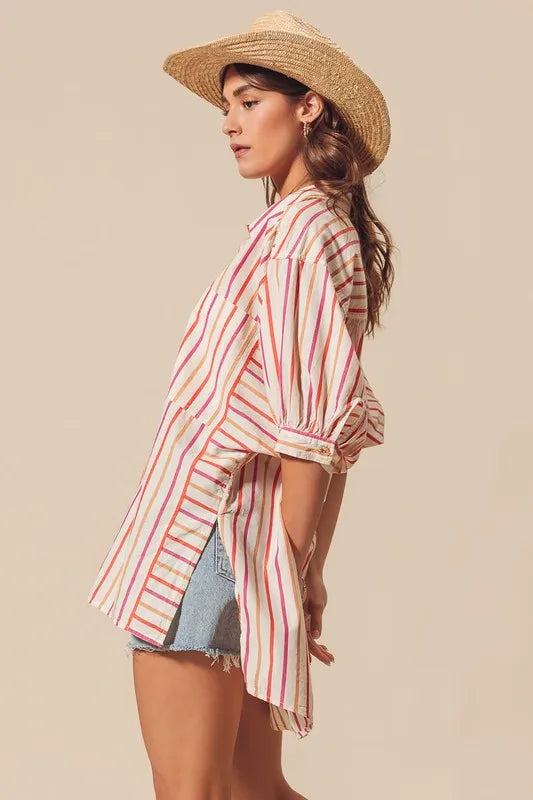 Multicolored stripe button-down shirt from SO ME by Trendsi, featuring pink, blue, and yellow stripes, long sleeves and a collar.