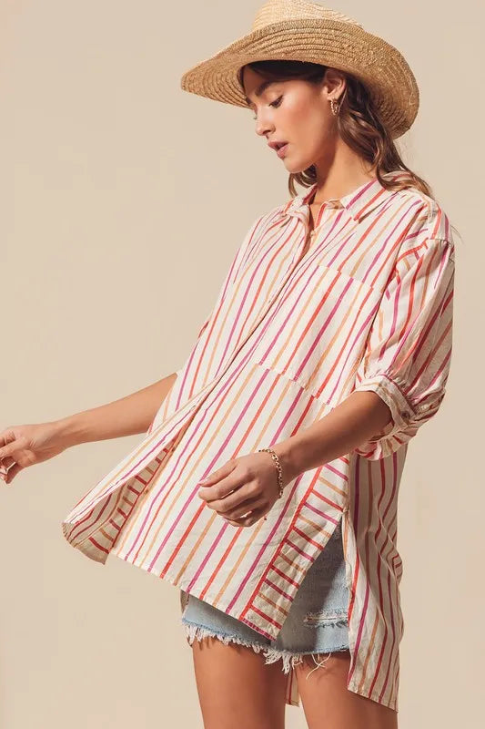 Multicolored stripe button-down shirt from SO ME by Trendsi, featuring pink and vibrant striped design.