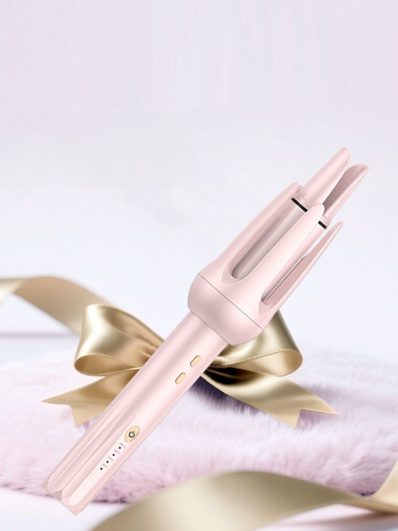 Pink automatic rotating ceramic hair curling iron by Trendsi with European plug for easy styling and even heat distribution.