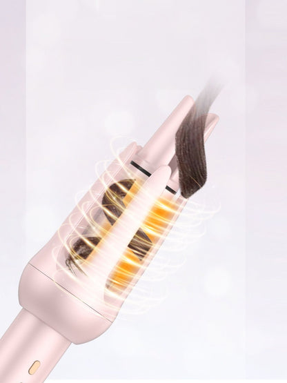 Pink automatic rotating ceramic hair curling iron by Trendsi with European plug, showcasing the curling barrel and ergonomic handle.