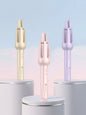 Trendsi automatic rotating ceramic hair curling iron with pink finish and European plug for easy styling.