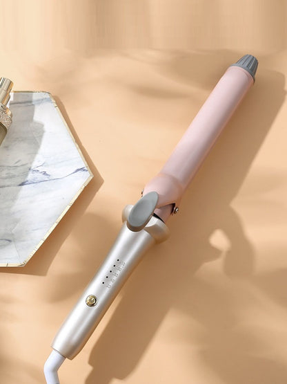Pink Trendsi fast heating curling iron with European plug for quick styling and smooth curls.
