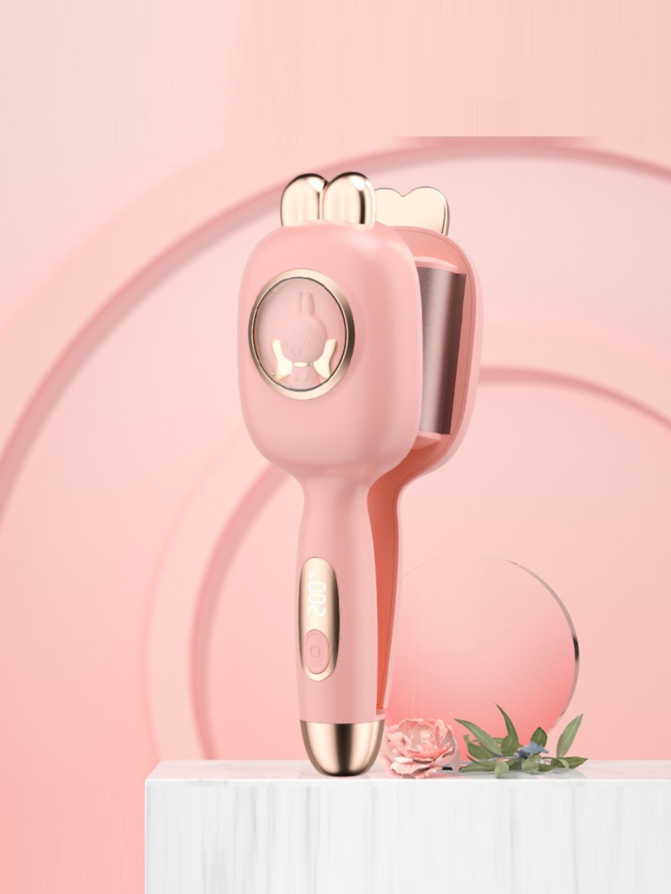 Pink Trendsi fast heating hair curling iron with European plug, showcasing its sleek design and curling barrel.