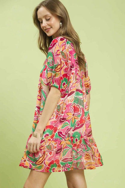 Pink abstract print V-neck baby doll dress by Umgee, featuring a relaxed fit and stylish design, perfect for casual wear.