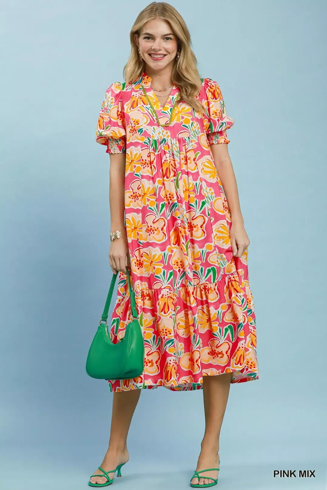 Pink floral print puff sleeve tiered midi dress by Umgee, featuring a flowy design and tiered skirt, perfect for spring or summer.