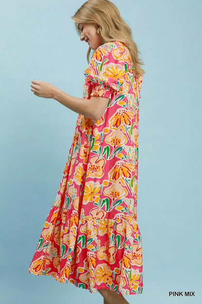 Pink floral print Umgee puff sleeve tiered midi dress with a flowy silhouette and feminine design.