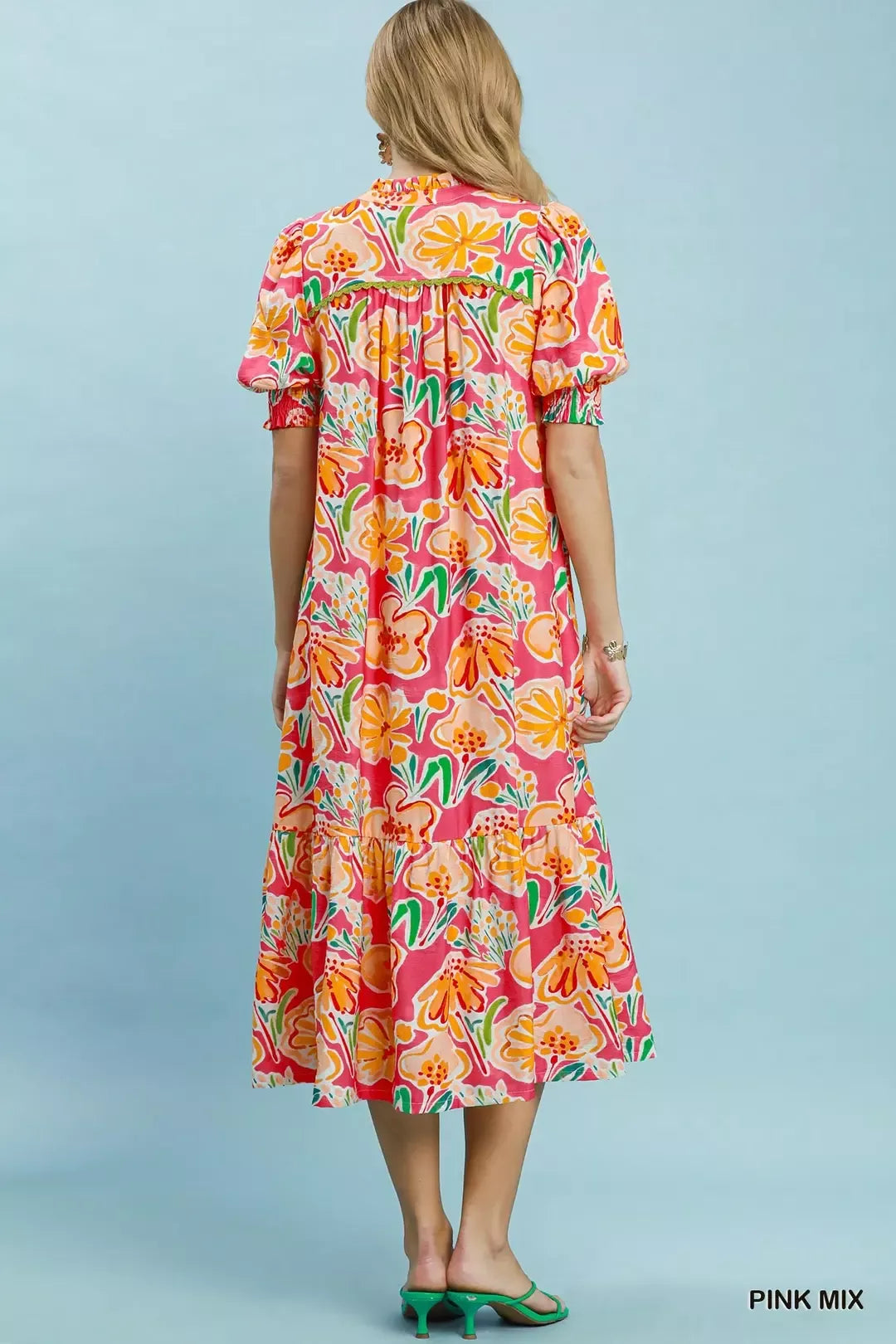 Pink floral print Umgee puff sleeve tiered midi dress with a flowy silhouette and tiered skirt, perfect for spring or summer.