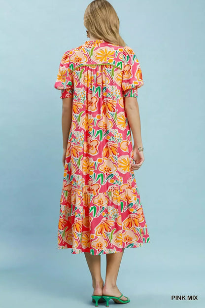 Pink floral print Umgee puff sleeve tiered midi dress with a flowy silhouette and tiered skirt, perfect for spring or summer.