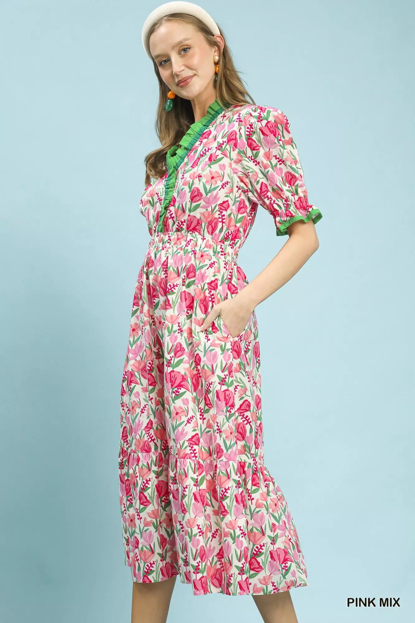 Pink Umgee floral tiered midi dress with ruffle trim, featuring a feminine floral pattern and layered design.