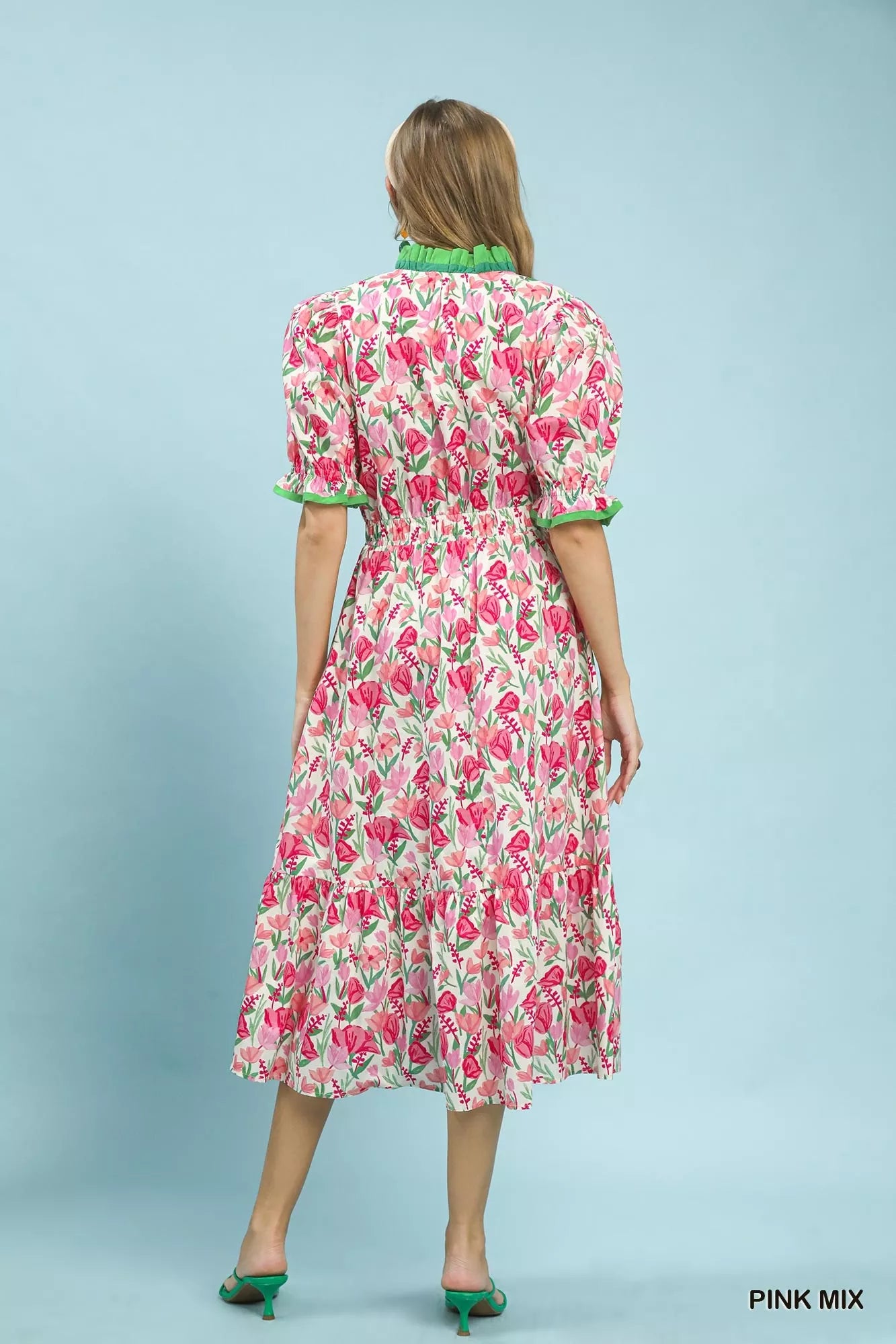 Pink floral ruffle trim tiered midi dress by Umgee, featuring a feminine floral pattern and flowing silhouette.