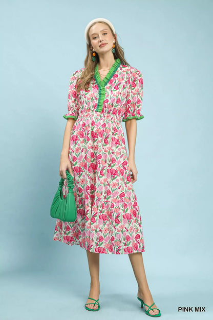 Pink floral Umgee tiered midi dress with ruffle trim and sleeveless design, perfect for spring and summer occasions.