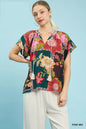 Pink floral patchwork tassel tie top by Umgee, featuring mixed patterns and a stylish tie detail, perfect for casual wear.