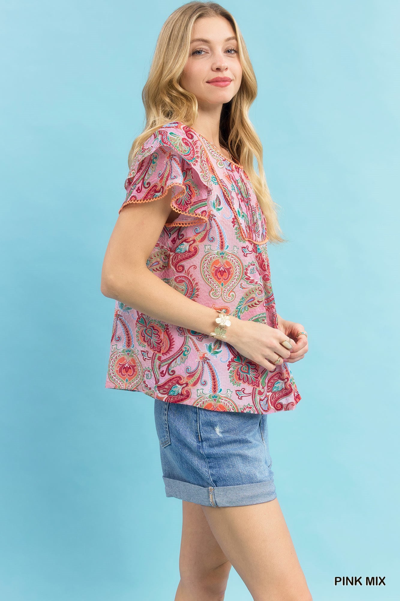 Pink Umgee Mix Paisley Ruffle Sleeve Top with flowy ruffled sleeves and a boho-inspired paisley pattern.