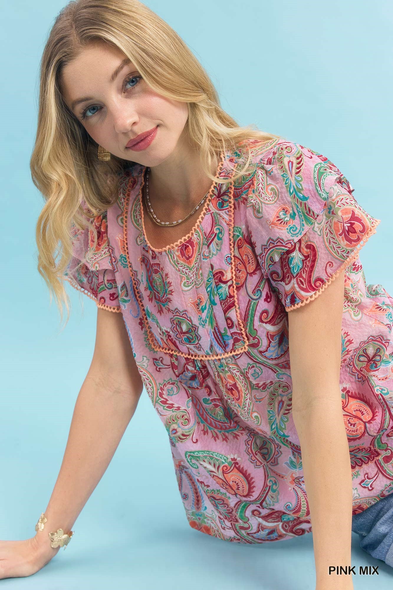 Pink Umgee Mix Paisley Ruffle Sleeve Top with flowy ruffled sleeves, stylish pattern, and relaxed fit.