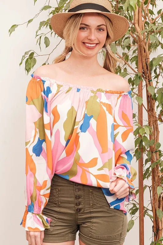 Pink and multi-colored Lime 'N' Chili abstract print off-the-shoulder long sleeve top by Trendsi, featuring a vibrant, stylish design.