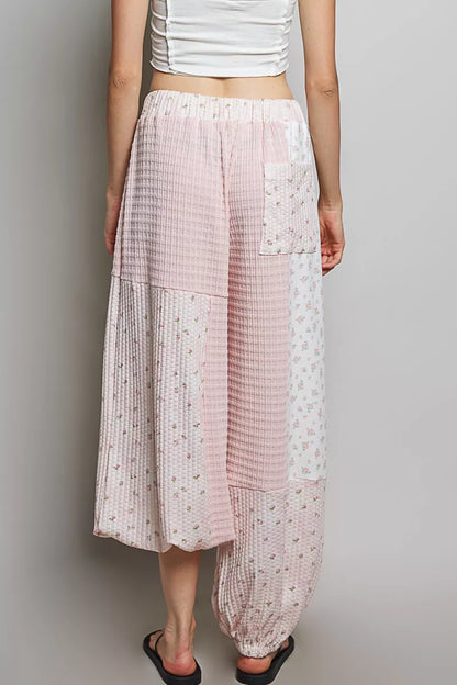 Pink patchwork mixed knit wide-leg pants from Trendsi with a relaxed fit and stylish design.