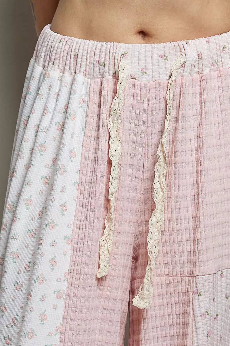 Pink patchwork mixed knit wide-leg pants from Trendsi featuring a relaxed fit and stylish design.