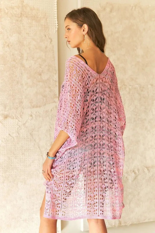 Pink ADORA crochet cover-up tunic top by Trendsi, featuring intricate crochet details and a relaxed, one-size fit.