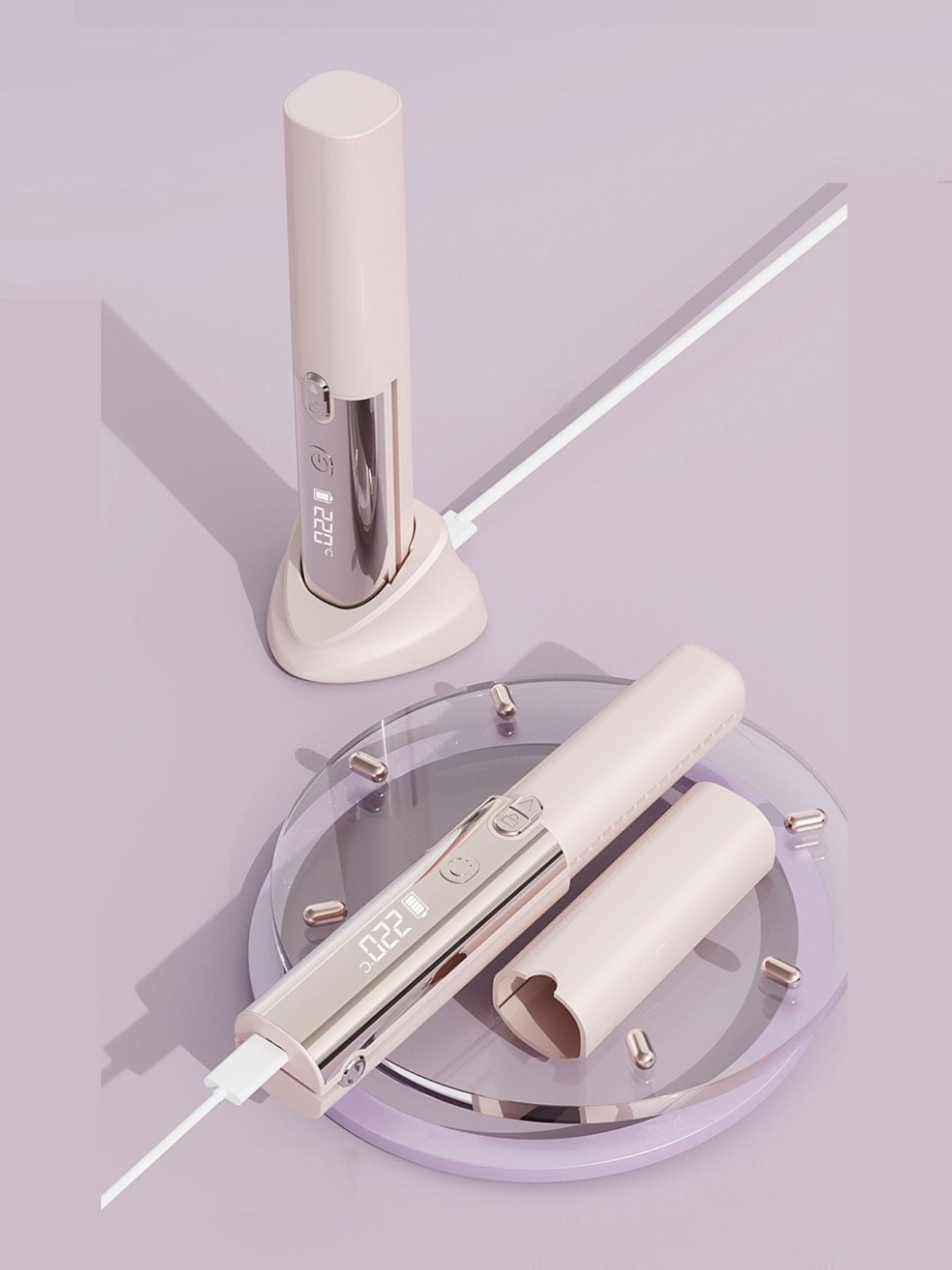 Pink cordless automatic hair curling iron by Trendsi with a sleek design and ergonomic handle for easy styling.