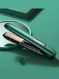 Pink portable cordless hair straightener by Trendsi, compact design ideal for on-the-go styling and easy straightening.