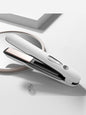 Pink portable cordless hair straightener from Trendsi with compact design for on-the-go styling and easy use.