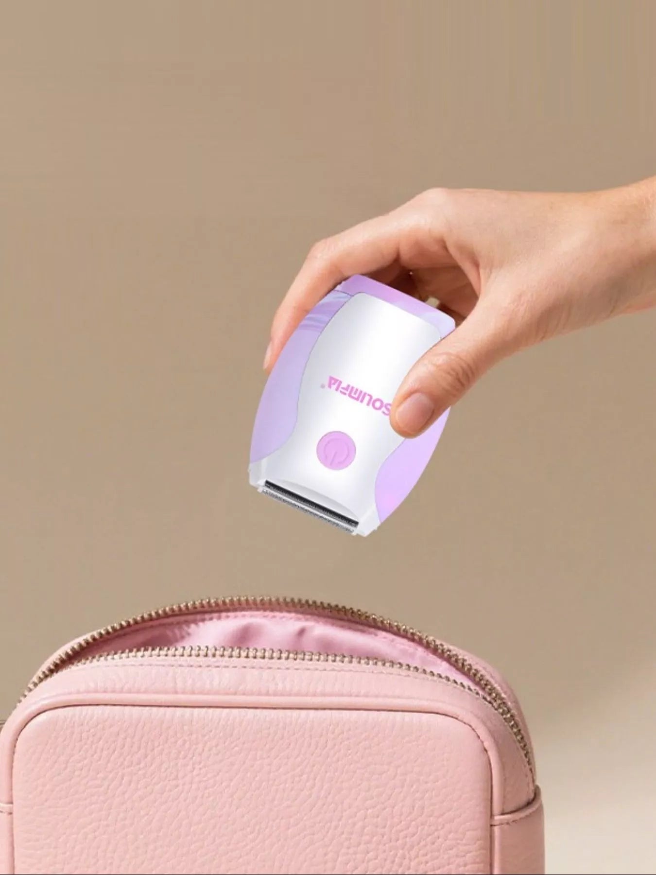 Pink portable Trendsi hair removal epilator with compact design and multiple attachments for easy, at-home hair removal.