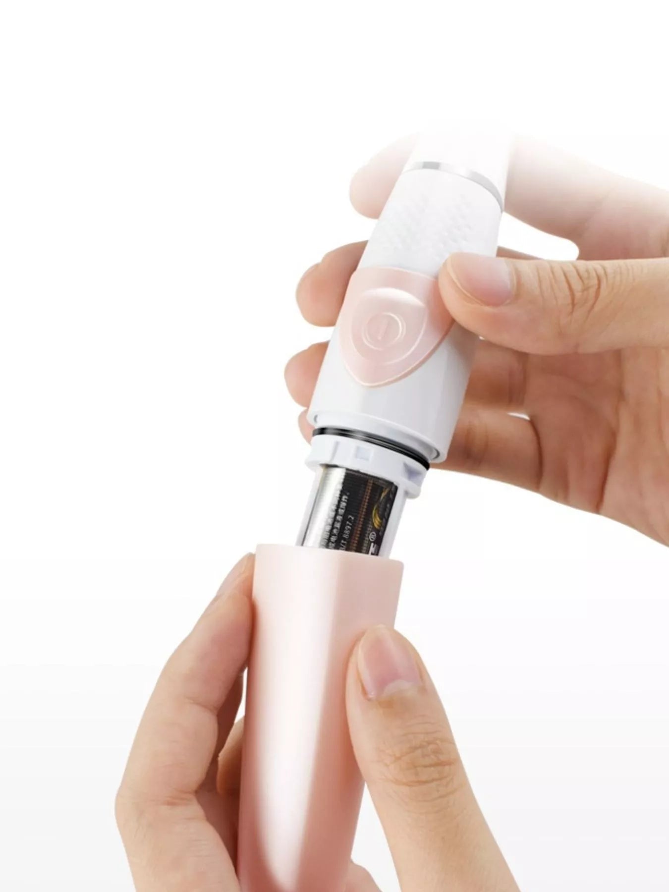 Pink portable hair removal epilator by Trendsi, compact design with multiple attachments for quick, easy hair removal at home.