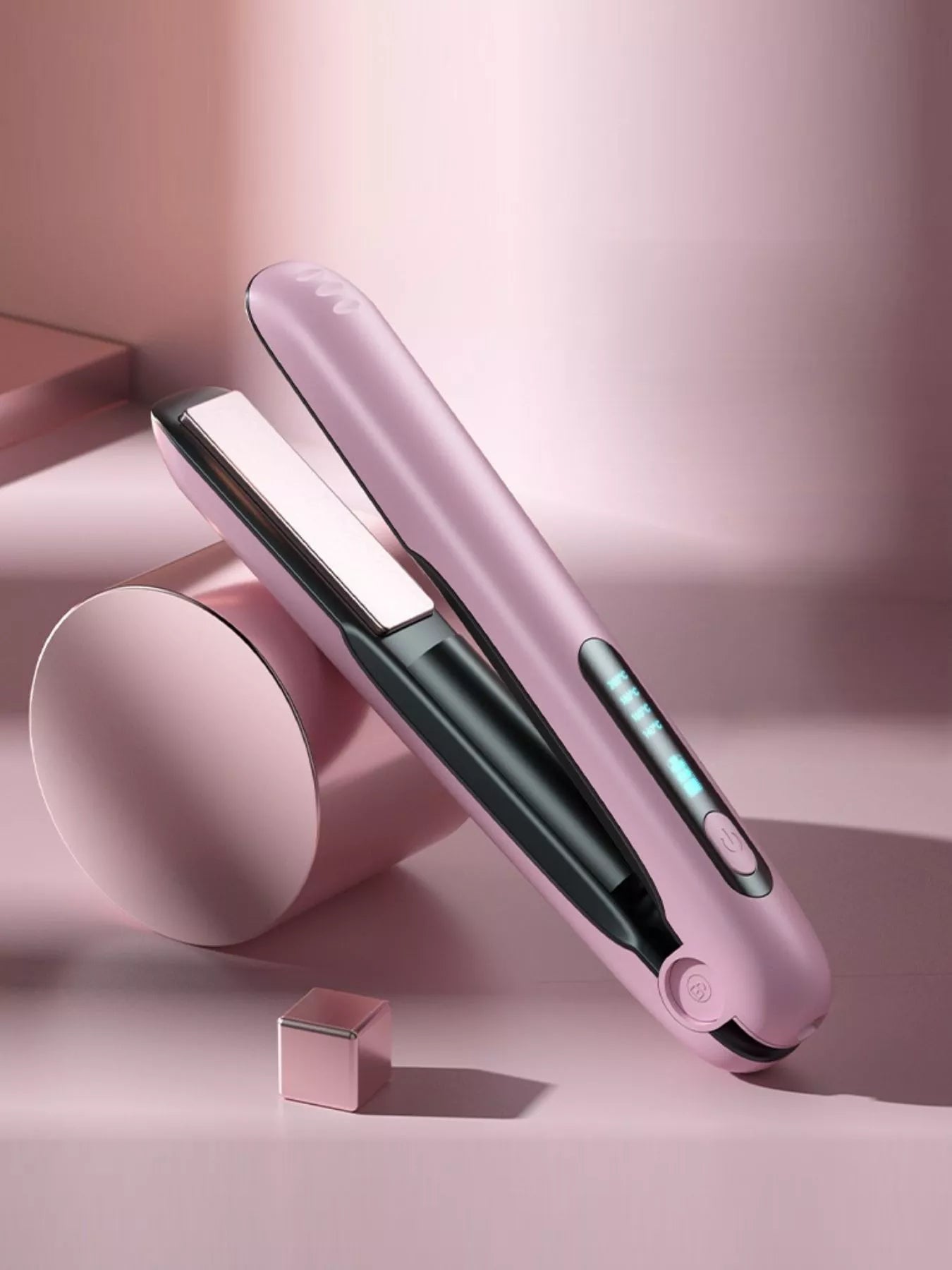 Pink Trendsi fast heating hair straightener with ceramic plates and digital temperature display for sleek, straight hair.