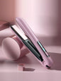 Pink Trendsi fast heating hair straightener with ceramic plates and digital temperature display for sleek, straight hair.