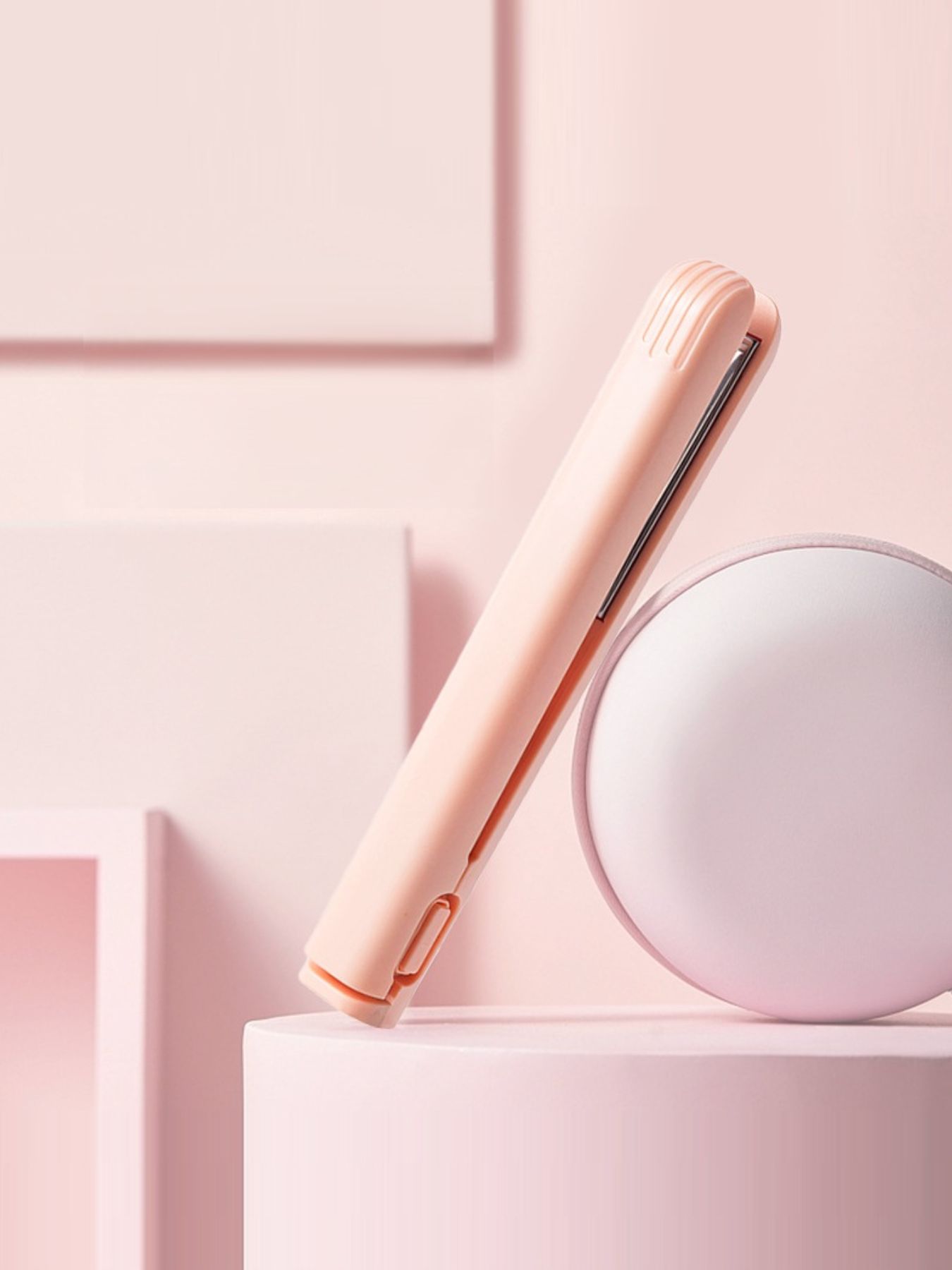 Pink portable cordless hair straightener by Trendsi, compact and easy to use for quick styling on the go.