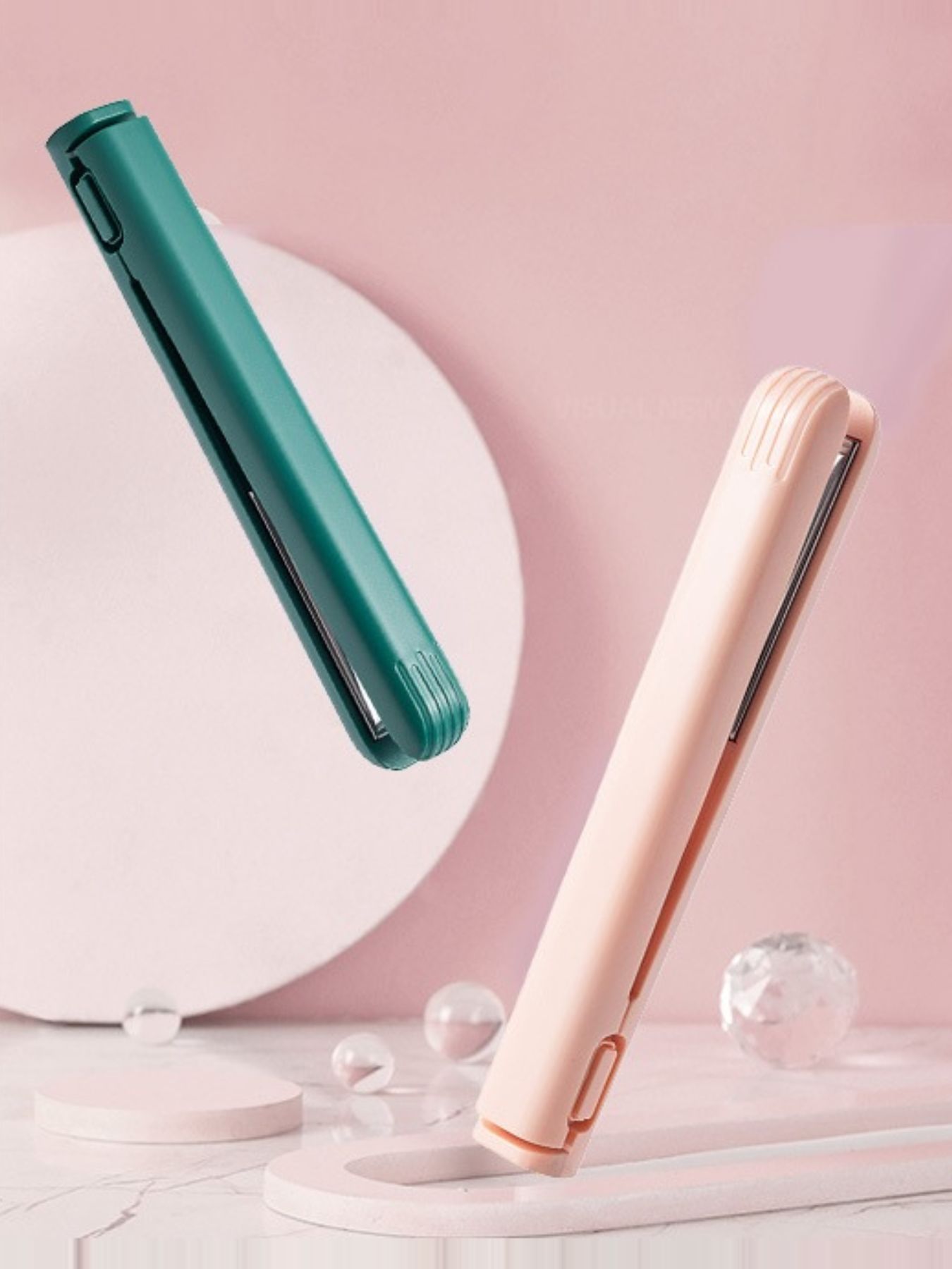 Pink portable cordless hair straightener by Trendsi, compact and easy to use for quick styling on the go.
