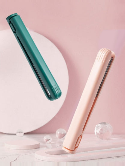 Pink portable cordless hair straightener by Trendsi, compact and easy to use for quick styling on the go.
