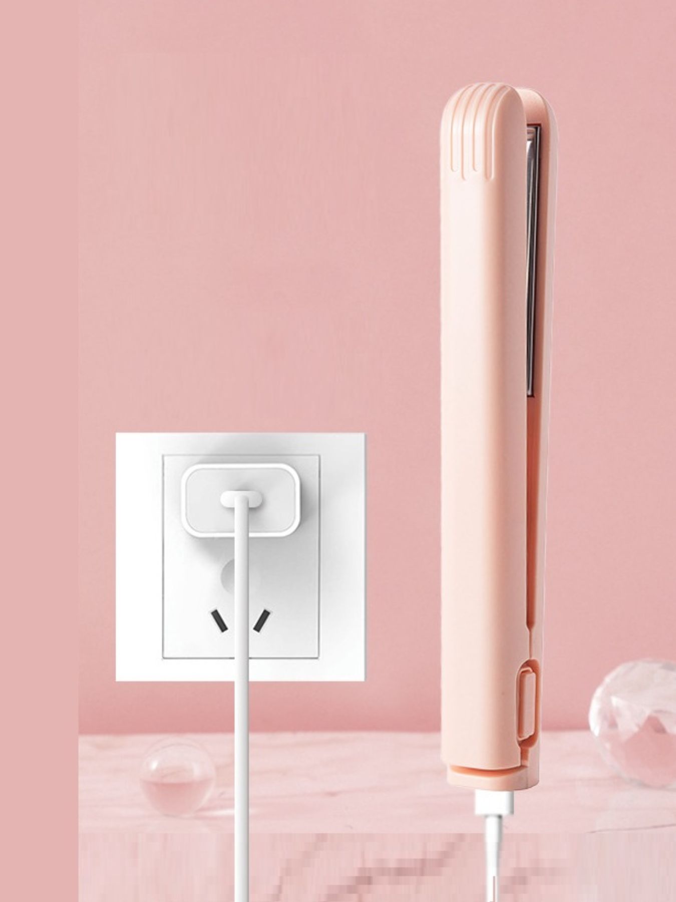 Pink Trendsi portable cordless hair straightener with a sleek design, ideal for quick styling on the go.