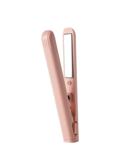 Pink portable cordless hair straightener by Trendsi with a sleek design, ideal for quick styling on the go.