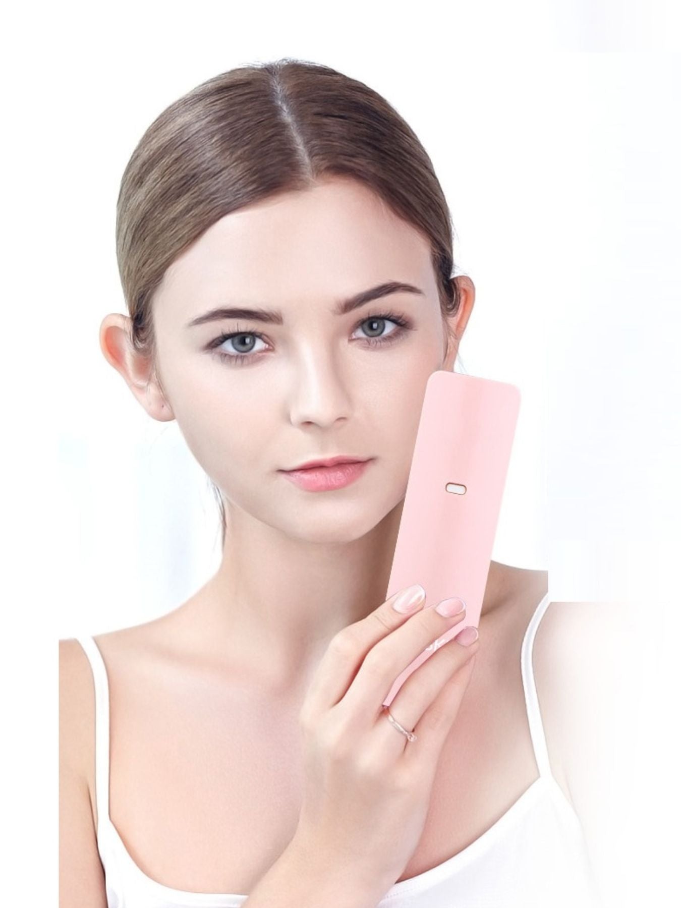 Pink portable facial beauty device by Trendsi, compact and handheld for skincare and facial treatments.