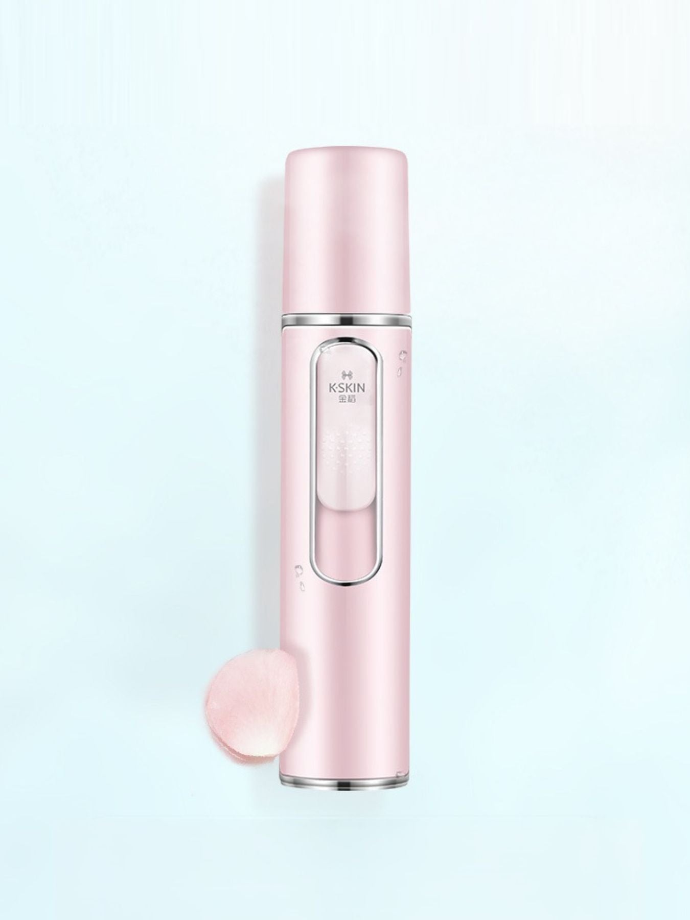 Pink portable facial mister beauty device by Trendsi, compact skincare gadget with a sleek design and misting nozzle for hydration.